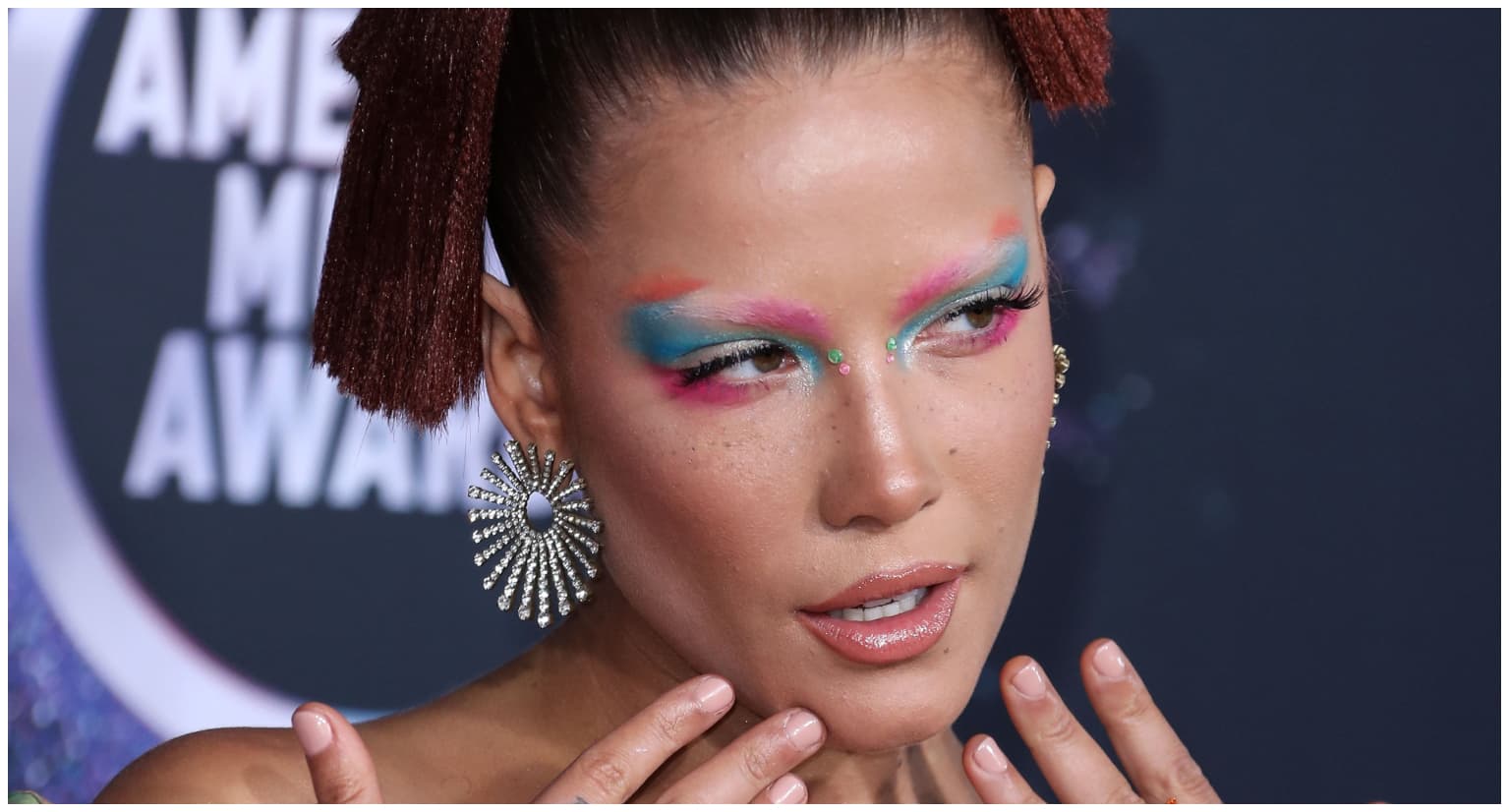 Pregnant Halsey shows off baby bump in floral bikini