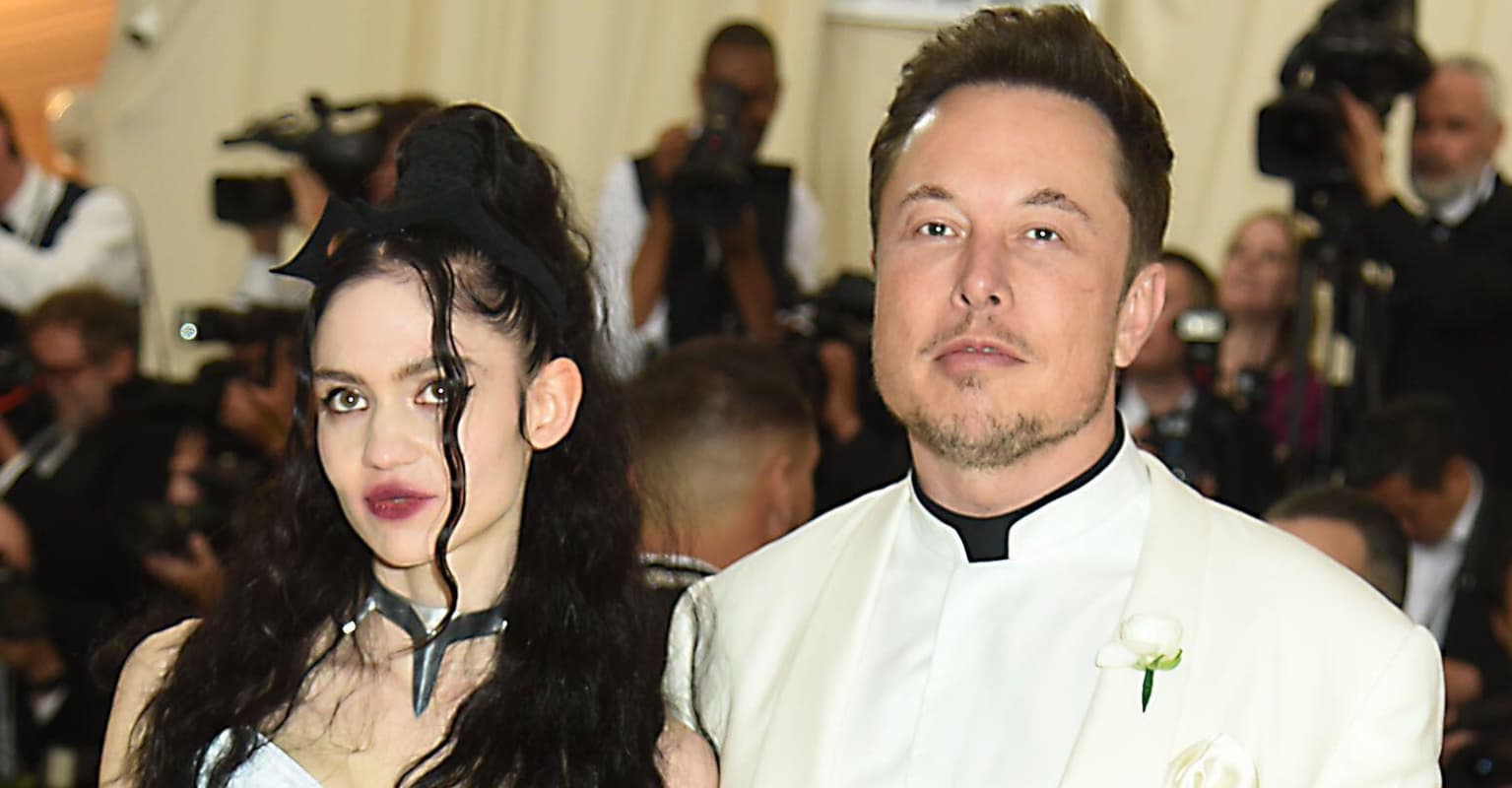 Elon Musk's girlfriend Grimes unveils painful 'alien scars' back tattoo