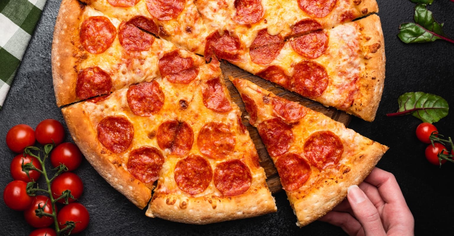 Customer tips delivery driver with slice of pizza - sparks fierce debate