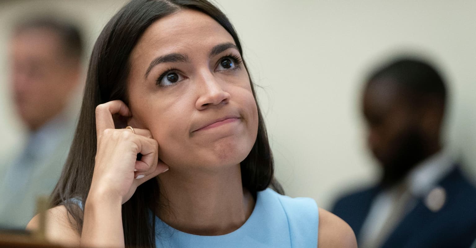 Alexandria Ocasio-Cortez hits back at Elon Musk's 'massive ego complex' after he accuses her of 'hitting on him'