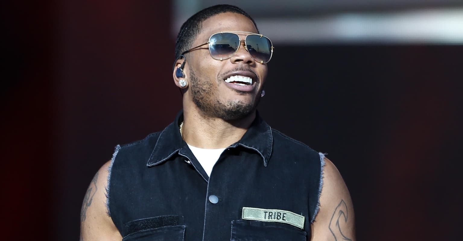Nelly roasts Madonna's racy new photos as he tells singer to 'cover up'