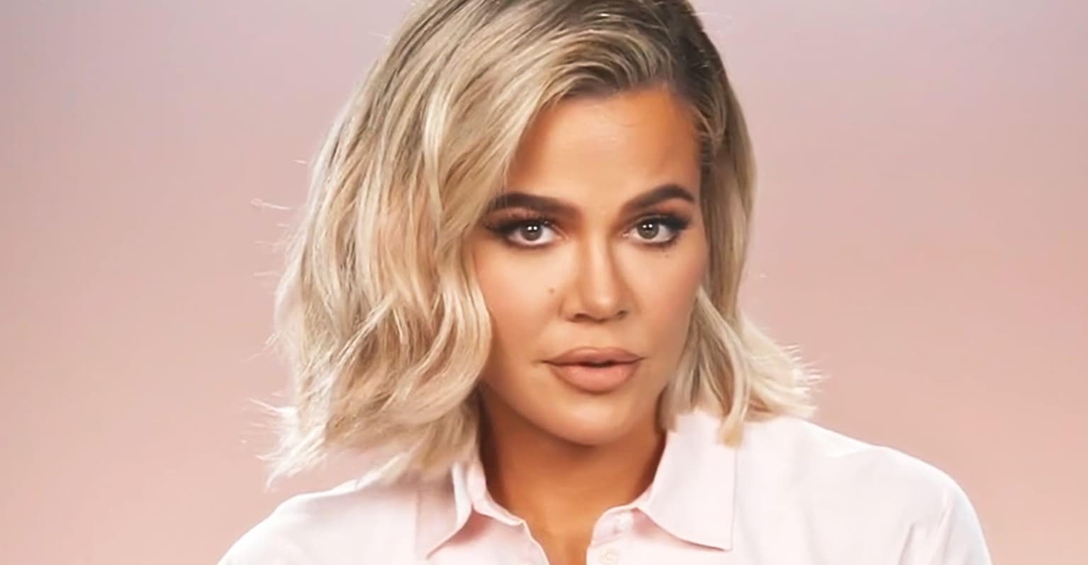 Khloe Kardashian hits back at troll who criticized her hands in topless post