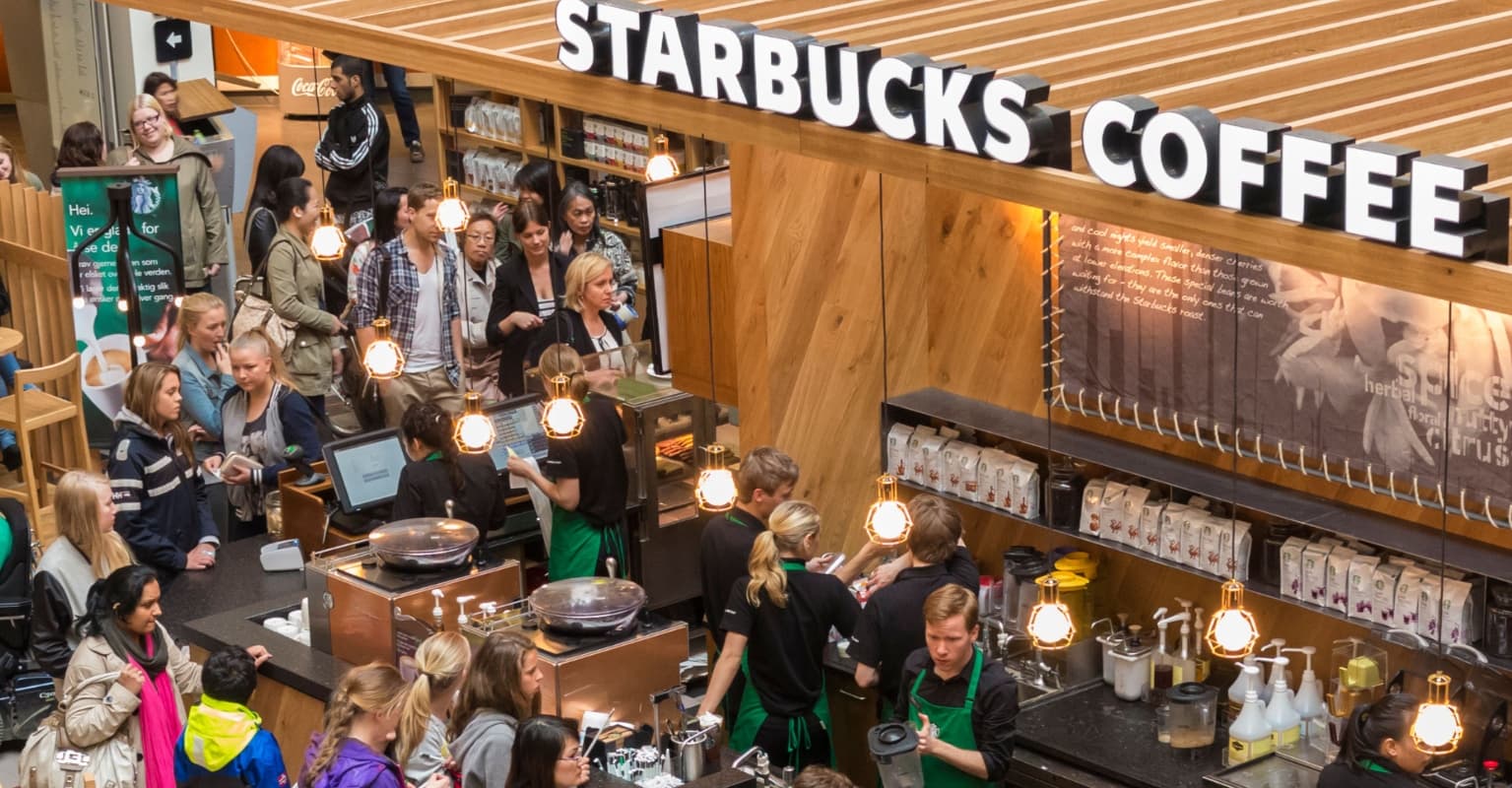 PETA activists glue themselves to Starbucks counters to protest additional charge for non-dairy milks