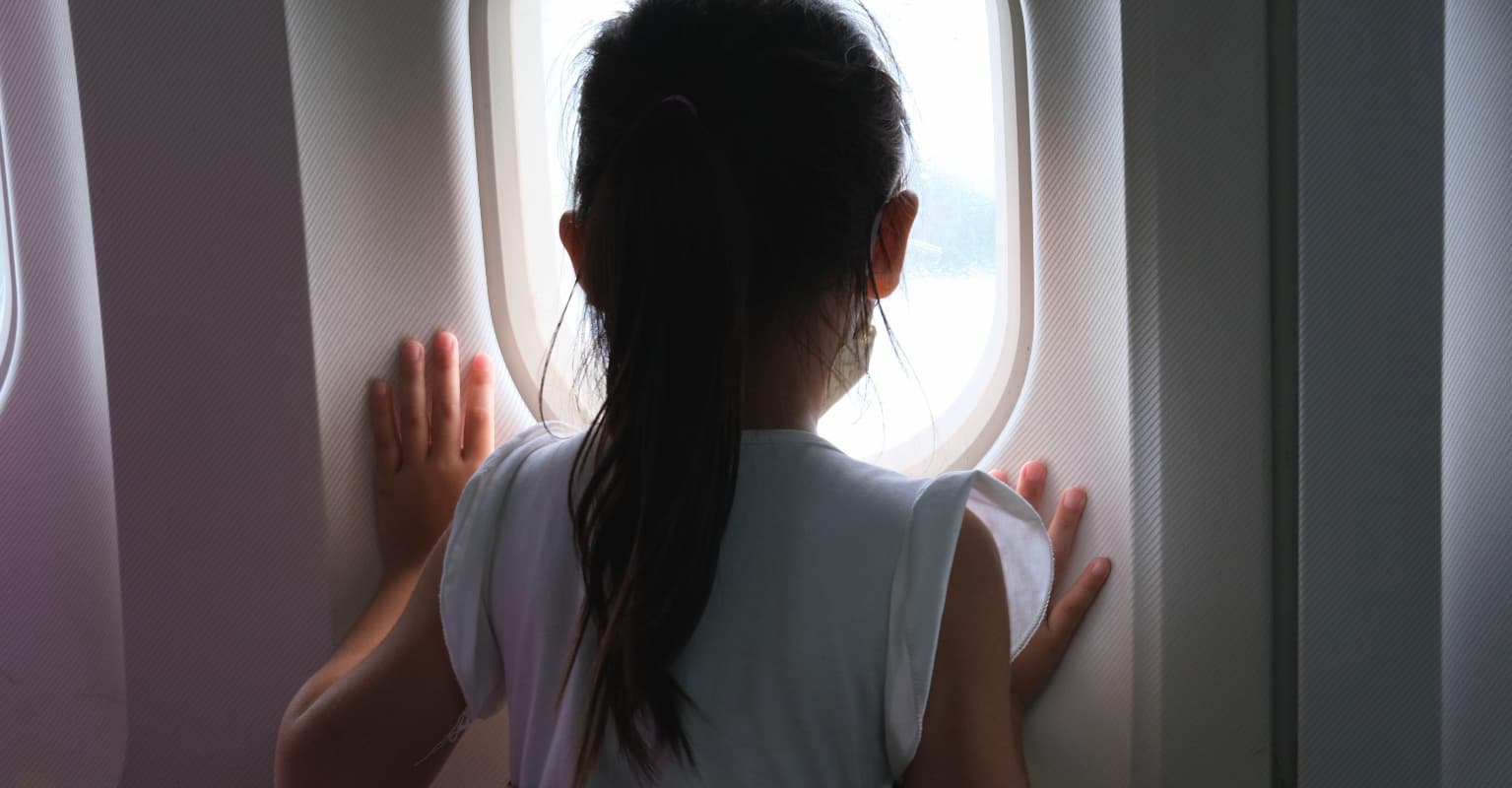 Woman calls for 'adults only flights' as child cries and kicks chair for the 'entire flight'