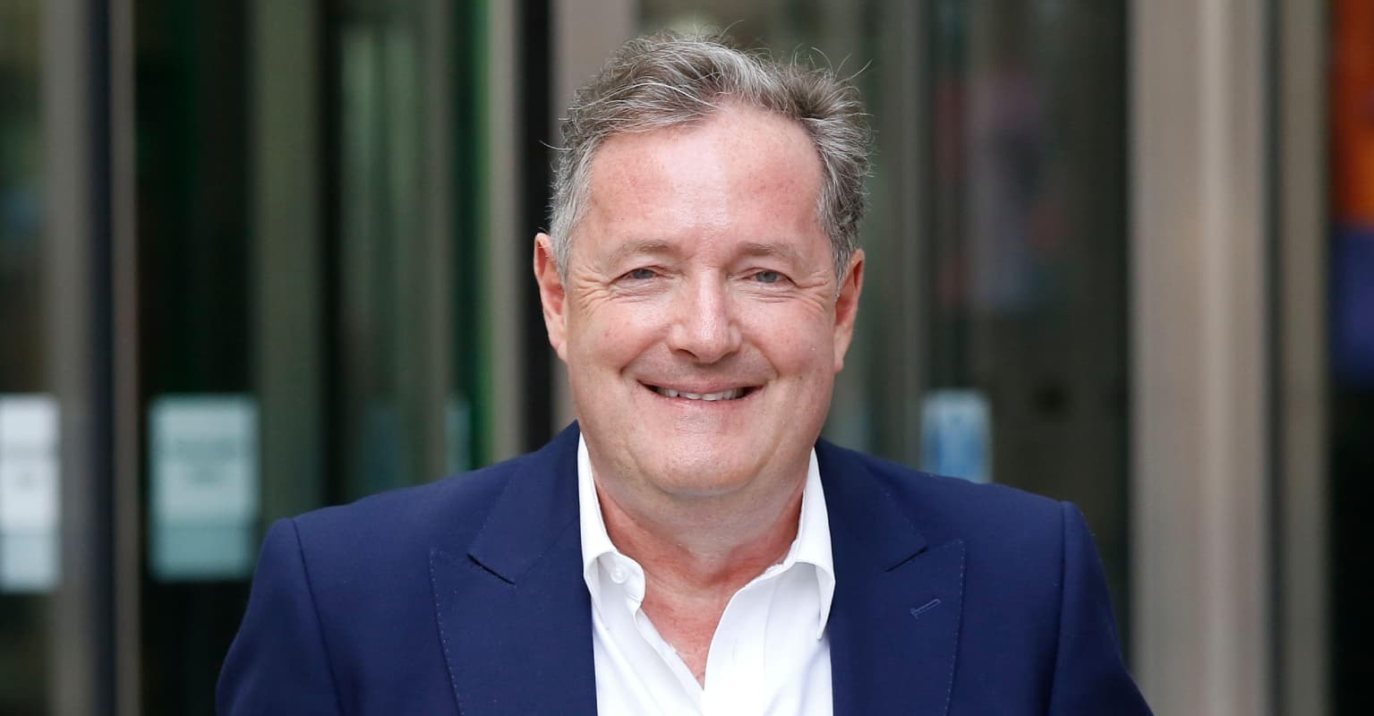 Piers Morgan shares photos of his wife to prove he 'doesn't fancy Meghan Markle'