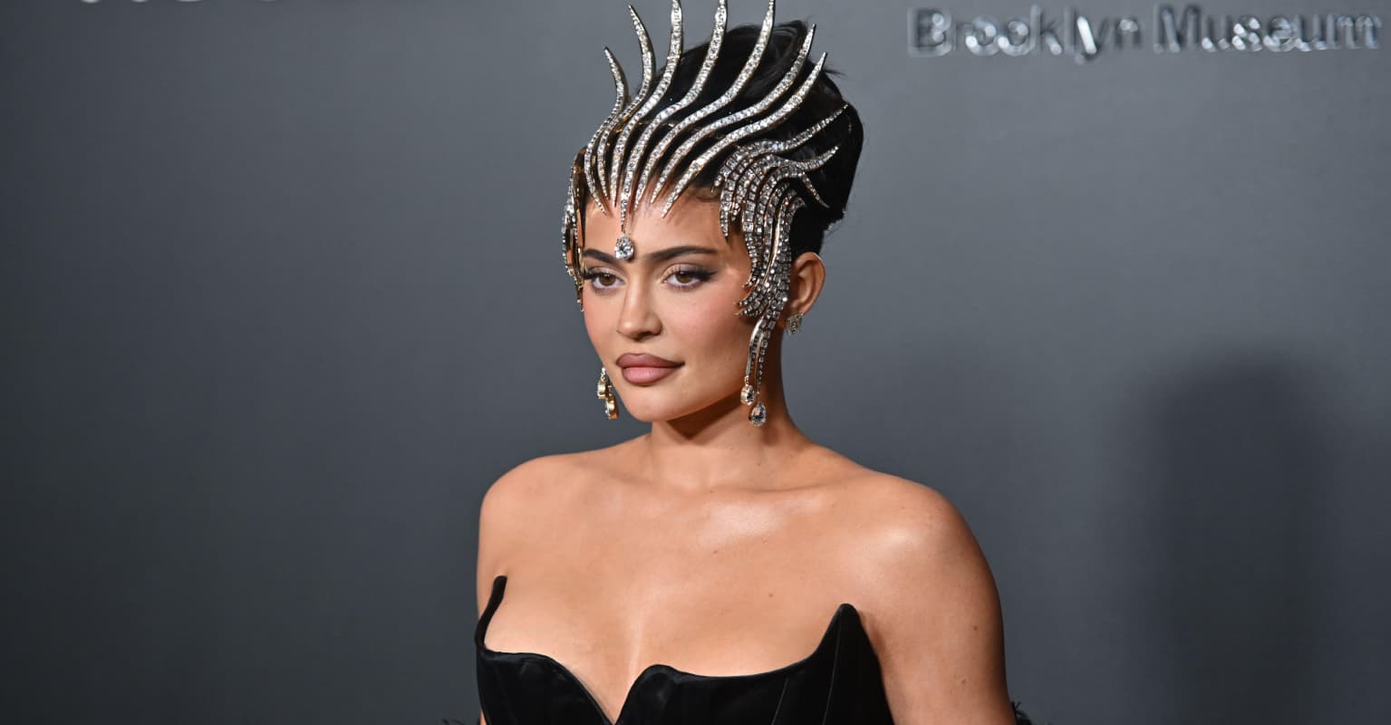 Kylie Jenner looks unhappy as Irina Shayk rocks up in the same 'lion head' dress