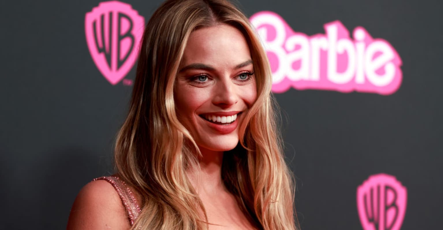 Margot Robbie praised as video of her surprising deaf fan by speaking sign language to him goes viral