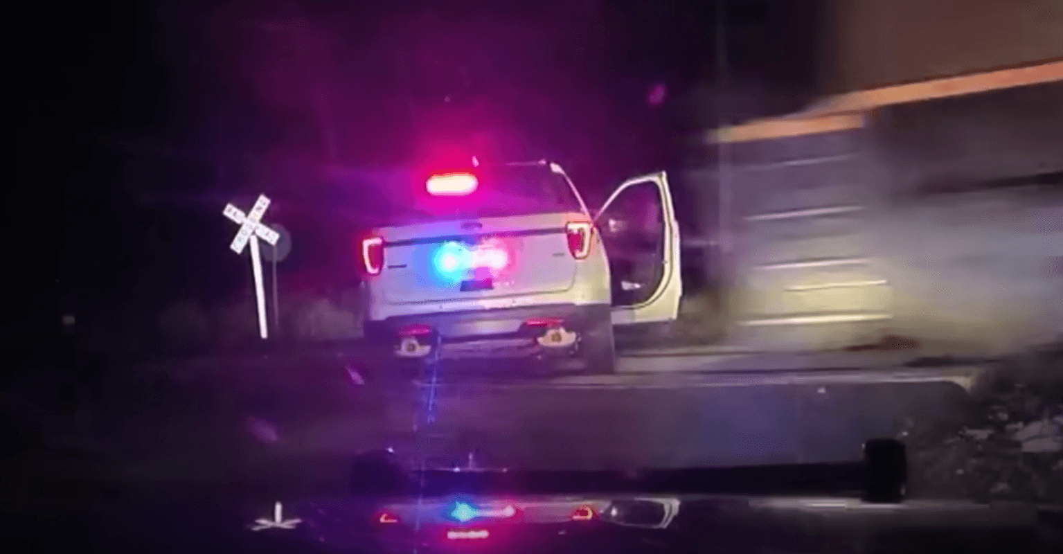 Cop who placed handcuffed woman into police car that was then hit by a train avoids jail time